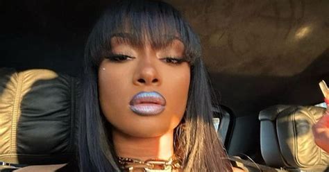 Megan Thee Stallion Wore Metallic Blue Lipstick To Louis 